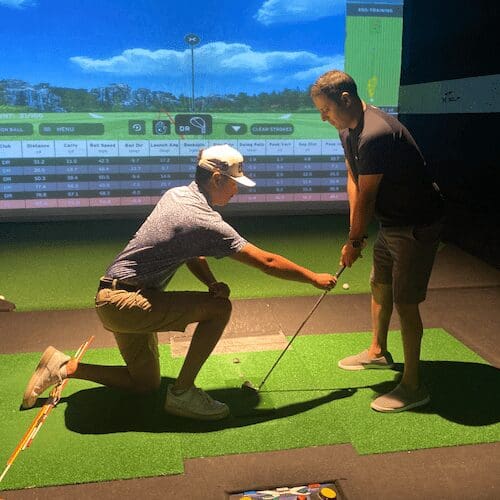 Golfer receiving professional golf lessons at Palos Heights